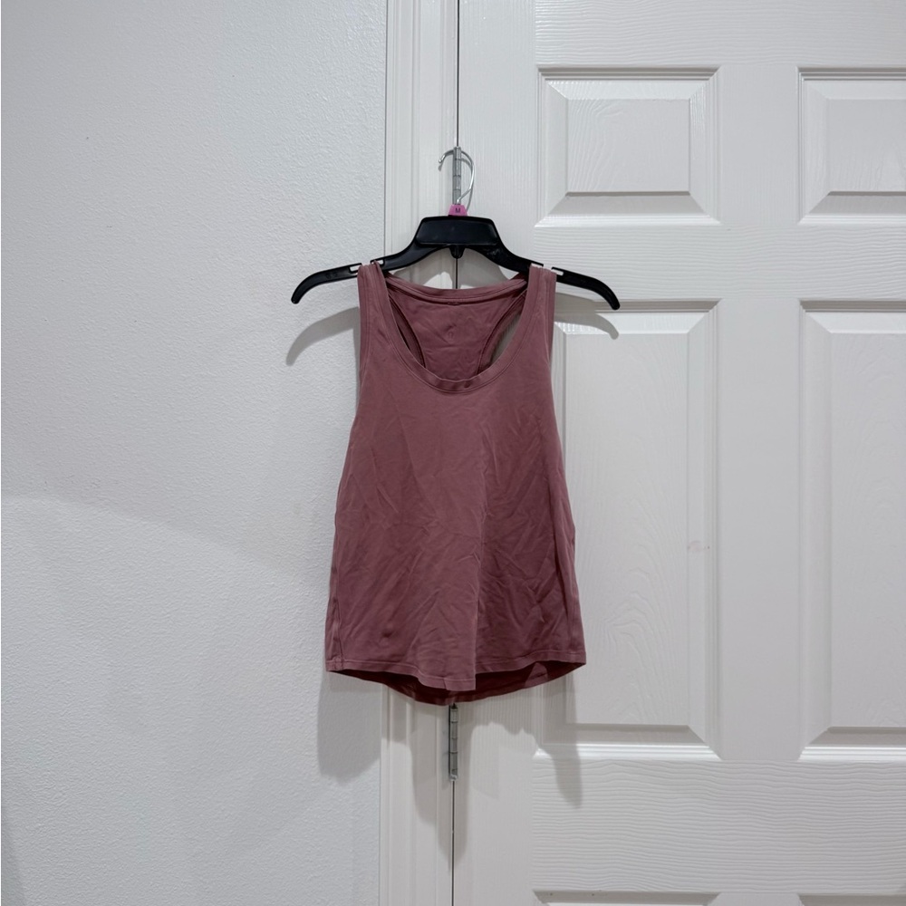 Womens red lululemon top - small bleach stain
